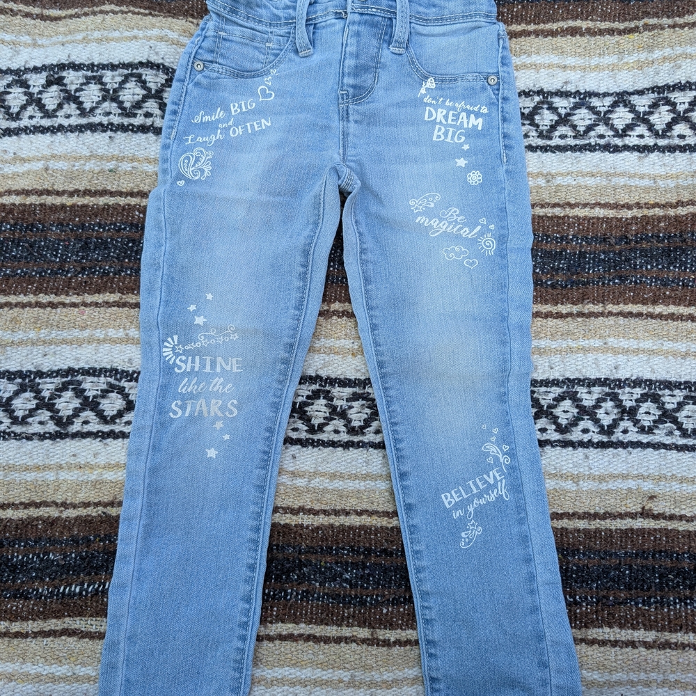 Squeeze Blue Jeans with Distressed Graffiti Details